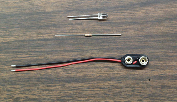 Components for the blue LED circuit: blue LED, 1 kohm resistor and 9-volt battery snap