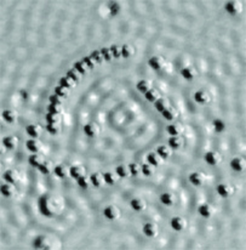 image of 10 atoms on a surface